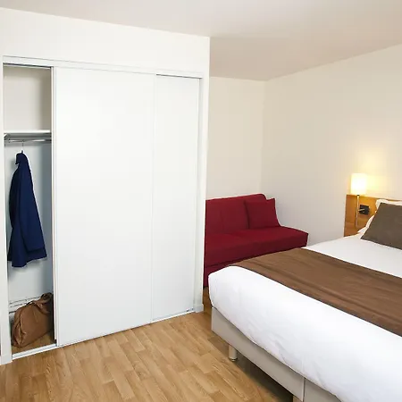 Sejours & Affaires Longs Champs Hotel apartamentowy 3*