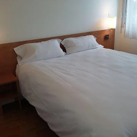Sejours & Affaires Longs Champs Hotel apartamentowy